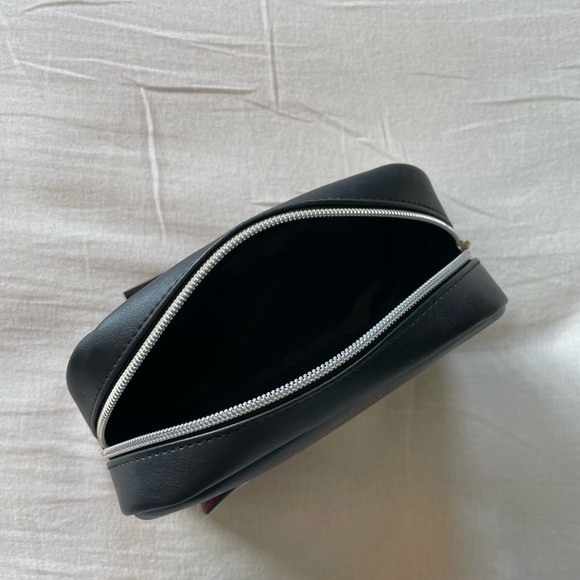 **3/$15** 
Travel pouch - Picture 2 of 5